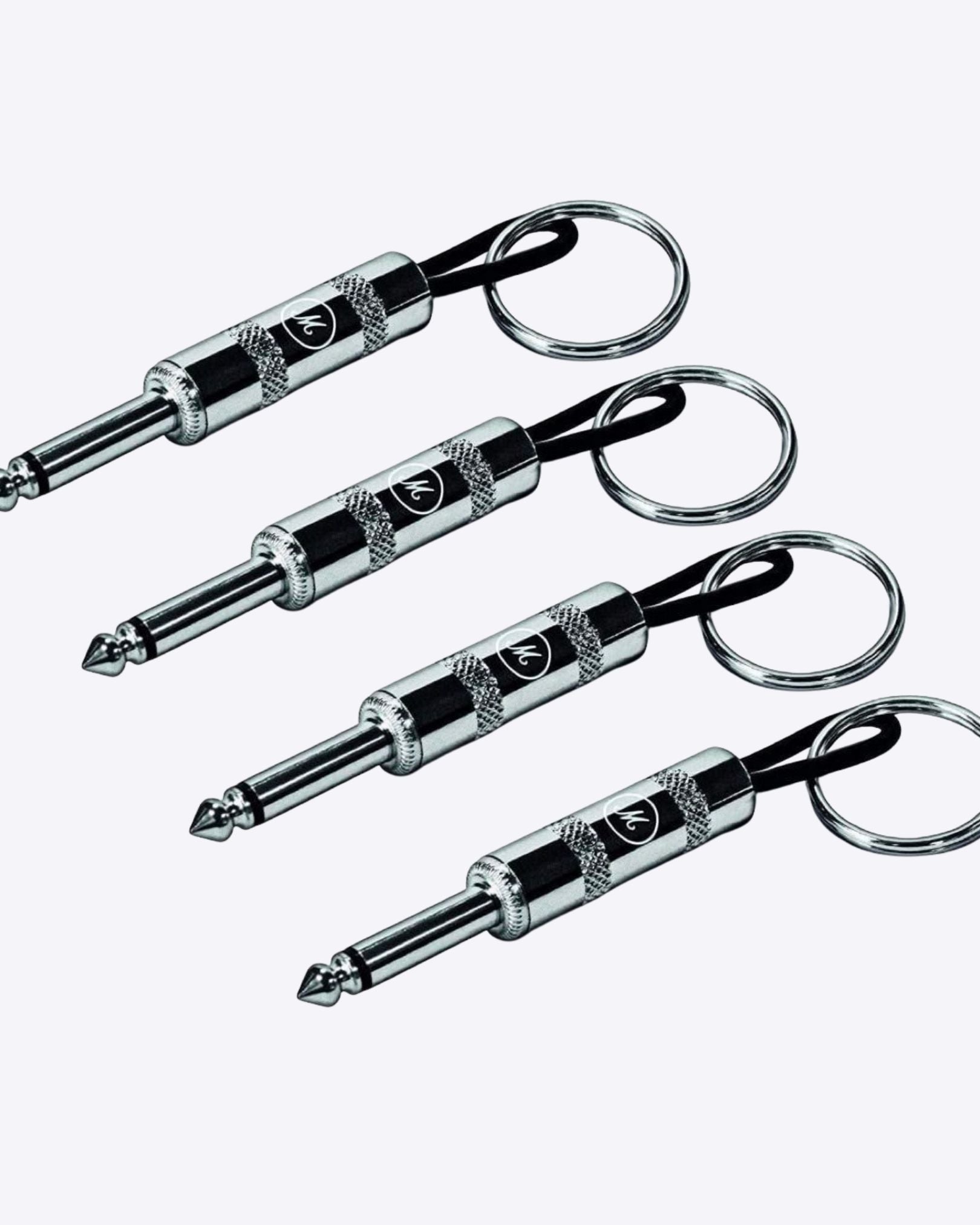 Full set including White Marshall key holder, four guitar plug keychains, and wall mounting hardware.