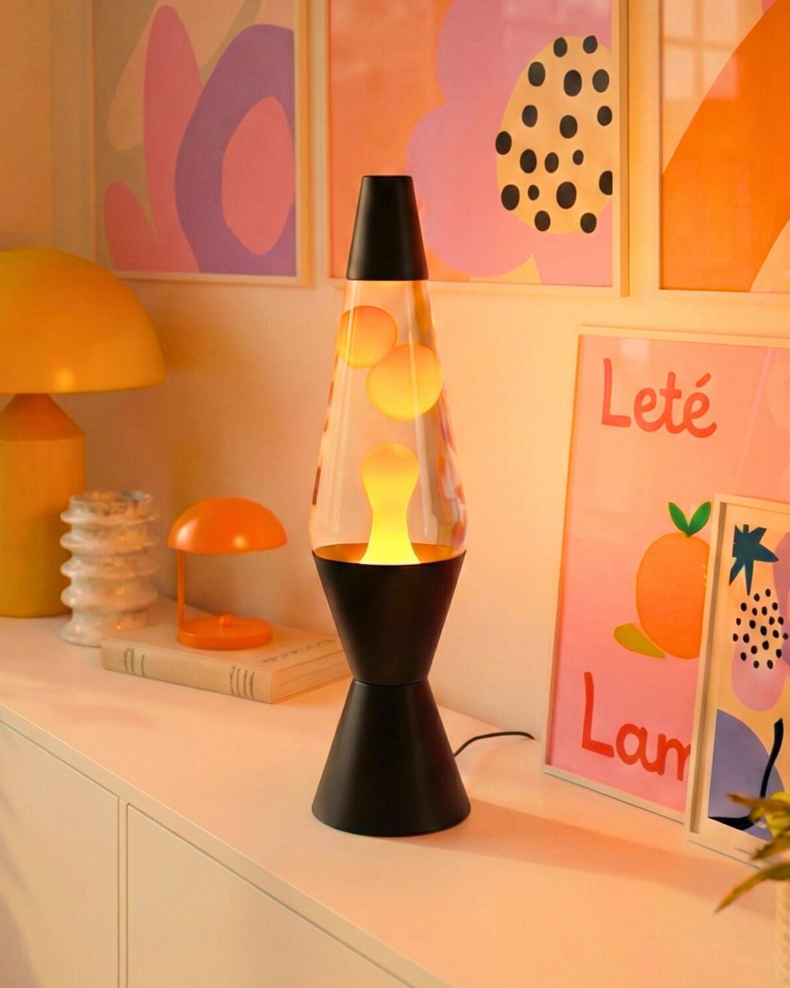 Illuminated lava lamp glowing in the dark, creating a relaxing and soothing ambiance for the room.