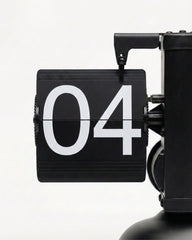 Close-up of the 24-hour military time display on a modern industrial style flip clock.