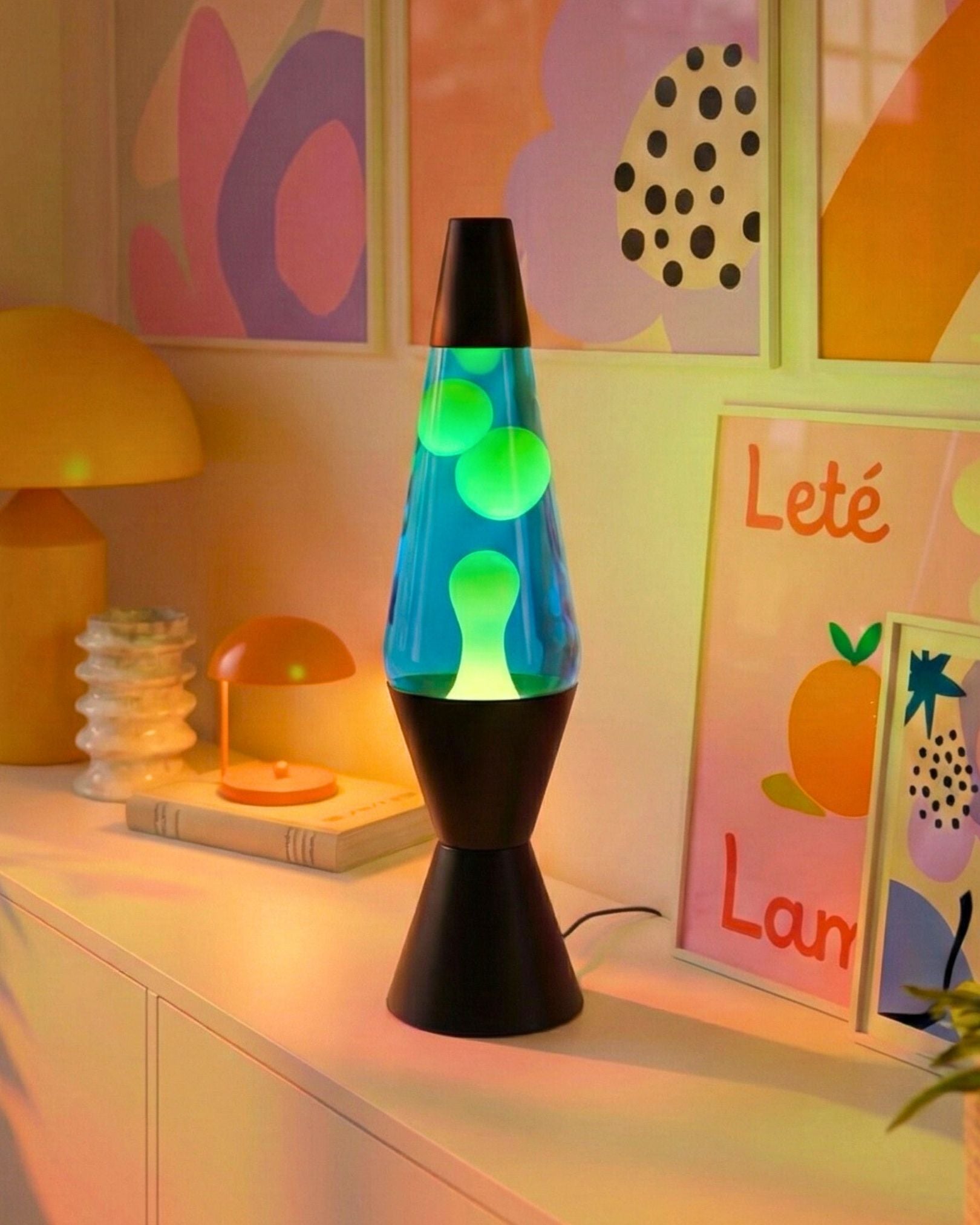Retro motion lamp featuring colorful wax floating in liquid, contrasting against the black housing.