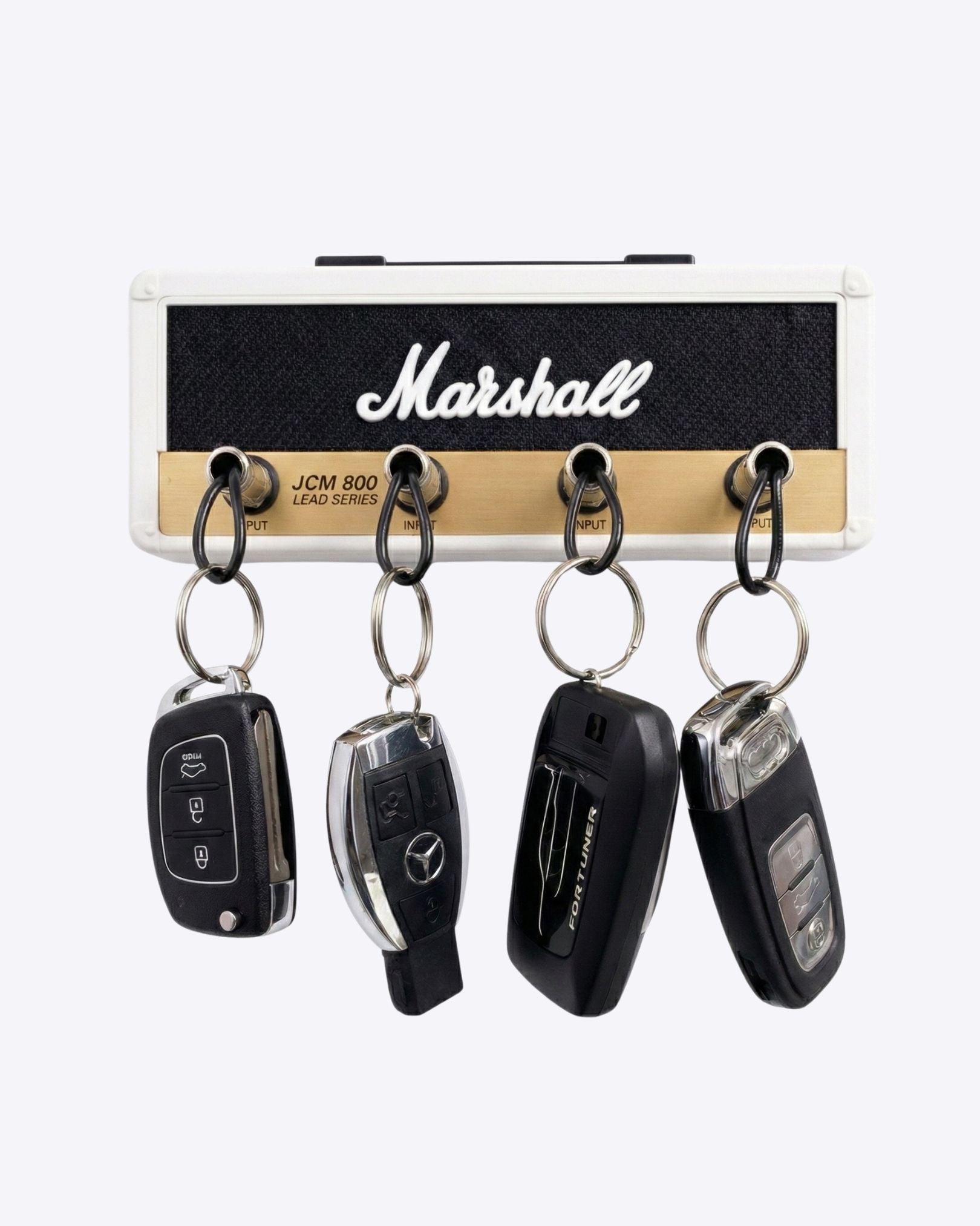 Close-up of the realistic amp texture and authentic brushed gold metal faceplate on the JCM800 key rack.